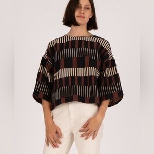 Ace and Jig Play Top